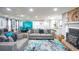 Open concept living room featuring modern decor, hardwood floors, and comfortable seating arrangement at 218 Ward Rd, Ellenwood, GA 30294
