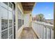 Private balcony with wooden deck and white railings at 2211 Westchester Rdg, Atlanta, GA 30329