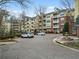 Luxury apartment building with brick facade and manicured landscaping at 2211 Westchester Rdg, Atlanta, GA 30329