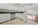 Modern kitchen with white cabinets and granite countertops at 2211 Westchester Rdg, Atlanta, GA 30329