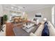 Living room with hardwood floors and open concept kitchen at 2211 Westchester Rdg, Atlanta, GA 30329