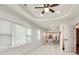 Bright and airy living room with tile floors and ceiling fan at 2705 Baker Ridge Nw Dr, Atlanta, GA 30318