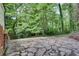 Large flagstone patio perfect for outdoor entertaining at 2705 Baker Ridge Nw Dr, Atlanta, GA 30318