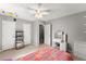 Spacious bedroom with a queen bed and plenty of closet space at 5737 Riverside Dr, Sugar Hill, GA 30518