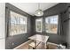 Bright eat-in kitchen with gray walls and white cabinets at 5737 Riverside Dr, Sugar Hill, GA 30518