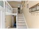 Interior view of a staircase with a loft area at 5737 Riverside Dr, Sugar Hill, GA 30518