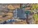 Aerial view of a house with backyard including a playset and shed at 6460 Boca Grande Blvd, Forest Park, GA 30297