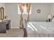 Spacious basement bedroom with a sleigh bed and desk at 6460 Boca Grande Blvd, Forest Park, GA 30297