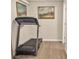 Basement featuring a modern treadmill for convenient home workouts at 6460 Boca Grande Blvd, Forest Park, GA 30297