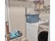 Basement laundry room with washer, dryer, and shelving at 6460 Boca Grande Blvd, Forest Park, GA 30297