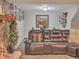 Finished basement with sectional sofa and dining area at 6460 Boca Grande Blvd, Forest Park, GA 30297