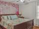 Spacious bedroom with floral wall tapestry and king-size bed at 6460 Boca Grande Blvd, Forest Park, GA 30297