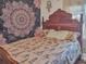 Cozy bedroom featuring a full-size bed with decorative tapestry at 6460 Boca Grande Blvd, Forest Park, GA 30297