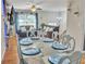 Dining room with hardwood floors and view into living room at 6460 Boca Grande Blvd, Forest Park, GA 30297