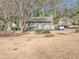 Gray house with brown accents and landscaping at 6460 Boca Grande Blvd, Forest Park, GA 30297