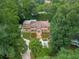 Brick house with large backyard, pool and driveway at 1195 Old Woodbine Rd, Atlanta, GA 30319