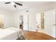 Bedroom with hardwood floors, ensuite bathroom, and walk-in closet at 1195 Old Woodbine Rd, Atlanta, GA 30319