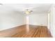 Large bedroom with hardwood floors and ceiling fan at 1195 Old Woodbine Rd, Atlanta, GA 30319