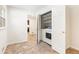 Convenient laundry room with washer, dryer, and built-in shelving at 1195 Old Woodbine Rd, Atlanta, GA 30319