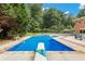 Inviting inground pool with diving board, ready for summer fun at 1195 Old Woodbine Rd, Atlanta, GA 30319