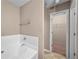 Bathroom with tub and access to closet at 3654 Woodland Cv, Decatur, GA 30034