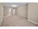 Spacious carpeted bedroom with ample natural light at 3654 Woodland Cv, Decatur, GA 30034