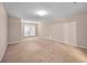 Spacious carpeted bedroom with large window at 3654 Woodland Cv, Decatur, GA 30034