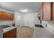 Kitchen with wood cabinets and tile flooring at 3654 Woodland Cv, Decatur, GA 30034