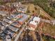 Aerial view of homes and community building in a residential neighborhood at 4143 N Swann St, Covington, GA 30014