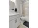 Clean bathroom with a shower/tub combo and white vanity at 4143 N Swann St, Covington, GA 30014