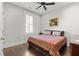 Bedroom with wood floors and a ceiling fan at 4143 N Swann St, Covington, GA 30014