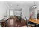 Open concept dining area with a round table and chairs, adjacent to the kitchen at 4143 N Swann St, Covington, GA 30014