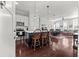 Modern kitchen with island and dark hardwood floors at 4143 N Swann St, Covington, GA 30014