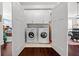 Convenient laundry room with washer and dryer in the unit at 4143 N Swann St, Covington, GA 30014