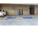 Two parking spaces and a storage room in a covered garage at 4143 N Swann St, Covington, GA 30014