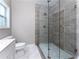 Bathroom with a large walk-in shower and marble tile flooring at 2711 Glenwood Se Ave, Atlanta, GA 30317