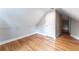 Bright bedroom with hardwood floors and white trim, featuring a closet for ample storage at 2711 Glenwood Se Ave, Atlanta, GA 30317