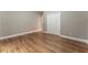 Hardwood floor bedroom with neutral wall colors at 2711 Glenwood Se Ave, Atlanta, GA 30317