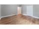 Bright bedroom featuring hardwood floors and an adjacent closet at 2711 Glenwood Se Ave, Atlanta, GA 30317