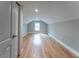 Large attic bedroom with hardwood floors and sloped ceilings at 2711 Glenwood Se Ave, Atlanta, GA 30317