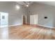 Large bedroom with hardwood floors and access to bathroom and closet at 2711 Glenwood Se Ave, Atlanta, GA 30317