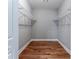 Walk-in closet with wire shelving and hardwood floor at 2711 Glenwood Se Ave, Atlanta, GA 30317