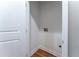 Convenient laundry closet with hookups and hardwood floors at 2711 Glenwood Se Ave, Atlanta, GA 30317