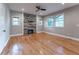 Open living room with hardwood floors and built in fireplace at 2711 Glenwood Se Ave, Atlanta, GA 30317