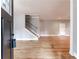 Bright and airy living room with hardwood floors and staircase at 2711 Glenwood Se Ave, Atlanta, GA 30317