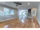 Spacious living area with hardwood floors and kitchen access at 2711 Glenwood Se Ave, Atlanta, GA 30317