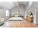 Spacious bedroom with hardwood floors, vaulted ceiling, ceiling fan, area rug, and tasteful decor at 2711 Glenwood Se Ave, Atlanta, GA 30317