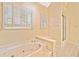 Bathroom with jetted tub, shower, and updated fixtures at 3483 Princeton Corners Dr, Marietta, GA 30062