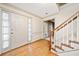 Bright foyer with hardwood floors, staircase, and natural light at 3483 Princeton Corners Dr, Marietta, GA 30062