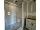 Bathroom with a large walk-in shower and built in bench at 261 Dahlia Dr, Woodstock, GA 30188